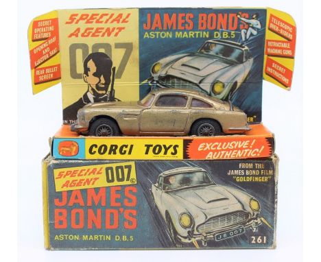 Corgi: A boxed Corgi Toys, Special Agent 007 James Bond Aston Martin DB5, 261, playworn vehicle, box worn, driver only figure