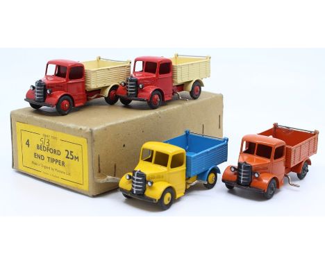 Dinky: A trade box, Dinky Toys, comprising four, 25M, Bedford End Tipper, two examples in red and cream, one example in yello