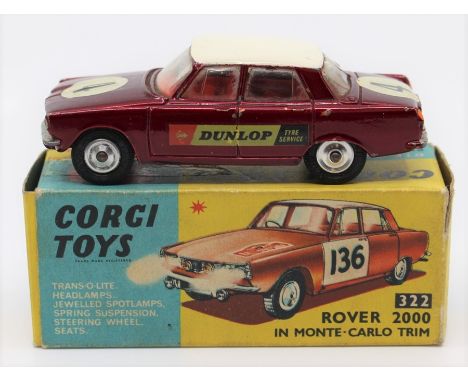 Corgi: A boxed Corgi Toys, Rover 2000 in Monte Carlo Trim, 322, metallic maroon body with white roof, paint chips to vehicle,