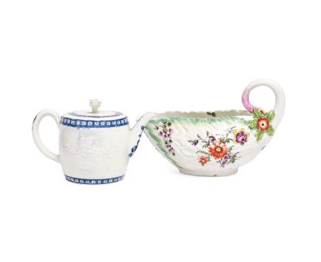 A Derby Porcelain Leaf Moulded Sauceboat, circa 1770, edged in green and painted with flowers in the cotton stem manner, patc