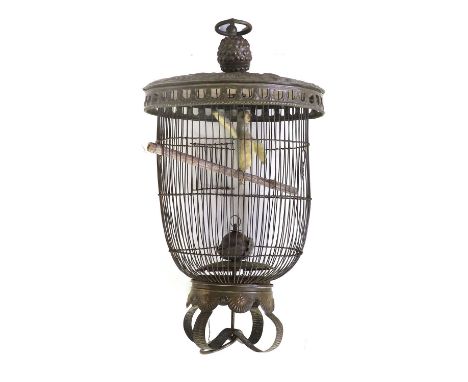 A Dutch Brass Bird Cage, dated 1734, with loop handle and pine cone finial over a foliate moulded cover, stamped I.W 1734, wi