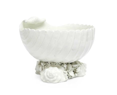 A Derby Porcelain Bowl, circa 1760, white glazed and modelled as on oversized shell, supported on three shells and encrusted 