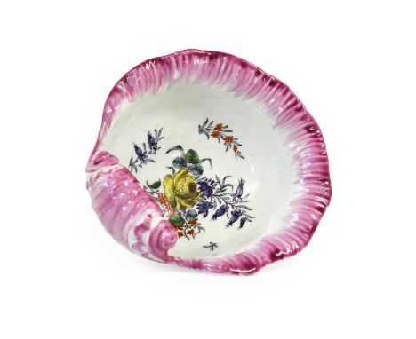 A Worcester Porcelain Shell-Shape Sweetmeat Dish, circa 1758, painted with a spray of flowers, scattered sprigs and insects w
