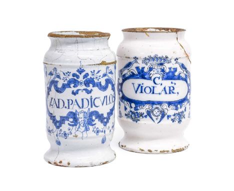 A Delft Albarello, 18th century, with a cartouche inscribe "C. Violar", surmounted by a fruit basket flanked by a pair of bir