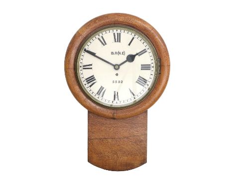 A North Eastern British Railway Drop Dial Wall Timepiece, B.R (N.E) numbered 5592, late 19th Century, oak veneered case with 