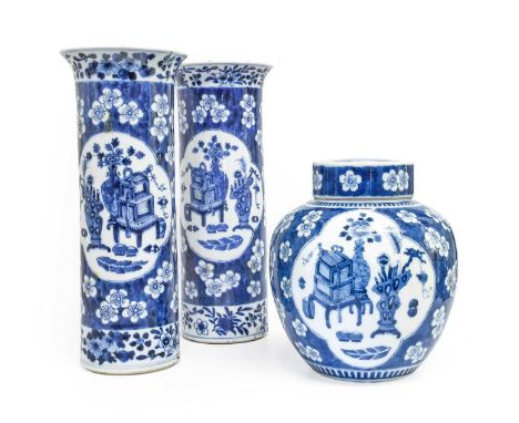 A Chinese Porcelain Ginger Jar and Cover, 19th century, painted in underglaze blue with scholarly objects reserved on a groun