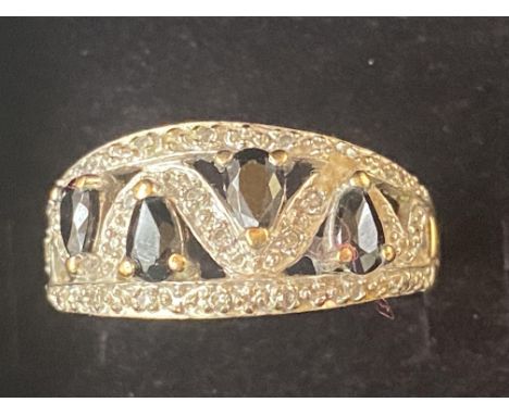 9ct Gold ring set with 4 blue stones Size S Weight 4.4g