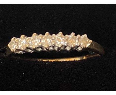 9ct Gold ring set with 7 diamonds Size M