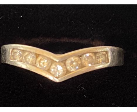 9ct White gold wishbone ring set with 7 clear stones Size M