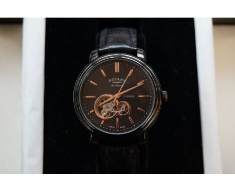 Rotary wristwatch calibre R.1003.21 - 21 jewels automatic. Black dial, rose gold batons 