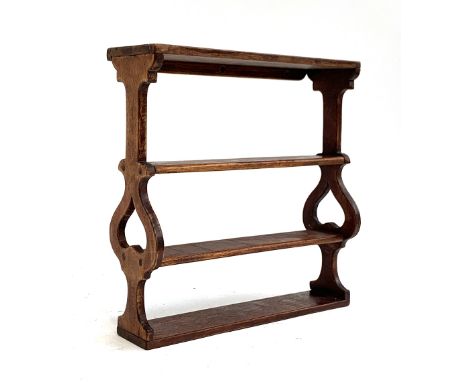 A small Arts and Crafts style wall shelf, 27x8.5x27.5cm 