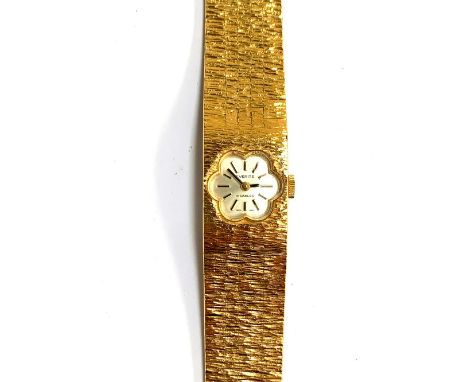 A vintage Everite Incabloc ladies wristwatch with flower shaped dial, the dial 1.3cmD 