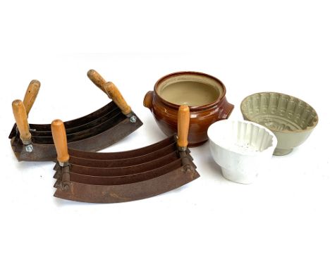 Vintage kitchenalia: comprising a four blade and five blade mezzaluna; two jelly moulds; and an earthenware pot 