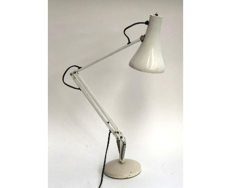 A white anglepoise lamp 