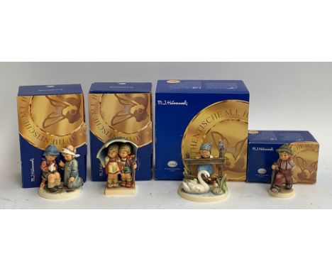 Four boxed Goebel Hummel figurines: 'Little Nurse', 'Stormy Weather', 'Feathered Friends', 'Grandpa's Boy' 