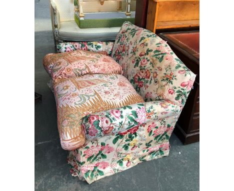 A two seater floral upholstered sofa, with mismatched feather filled cushions, 134cmW 