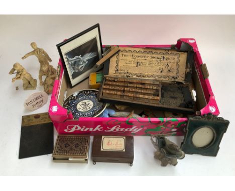 A mixed lot to include 'The Economy Sign Marker'; pottery musicians; vintage glass Dolphin figure etc 