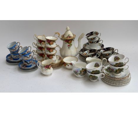 A Royal Albert Country Roses coffee service, 15 pieces including cups (6), saucers (6), milk jug, sugar bowl and coffee pot; 