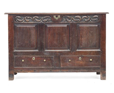 An 18th century oak three panel mule chest, panelled sides, 127cm wide, 55cm deep, 83cm high 
