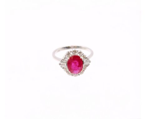 A ruby and diamond 18ct white Art Deco style cluster ring, the central ruby weighing approx 2.05carats, pinkish red, as state