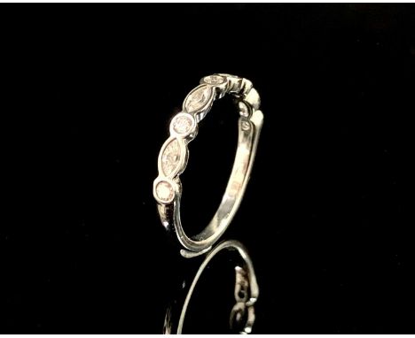 A platinum half-eternity ring set with alternating brilliant and marquise cut diamonds totalling 0.6ctsCondition report: Size