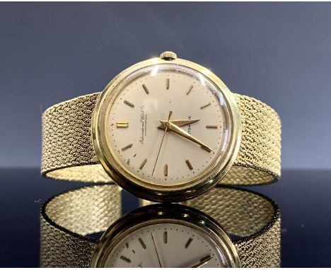 A gentleman’s 18-carat gold automatic 1960s wristwatch, cream dial, dagger numerals, centre sweep seconds, IWC 21 jewel calib