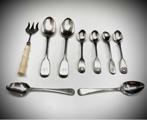 A pair of silver fiddle and shell pattern egg spoons and other plain spoons 5.3oz together with an engraved silver bread fork