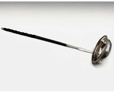 A George lll silver punch ladle London 1792