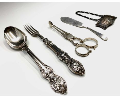 A Victorian child's spoon and fork by Aaron Hadfield, victorian sugar scissors a butter knife and a Sheffield plated Brandy l