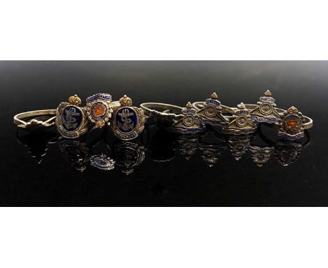 Ten silver and enamel rings each with a British services badge for either the Royal Navy, The Royal Engineers or The Royal Ar