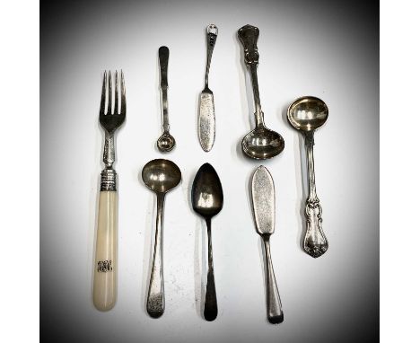 A pair of Victorian silver salt spoons, three other spoons two butterknives and a fork