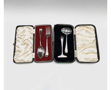 A set of six silver handled fruit knives, a set of six silver coffee spoons, a child's silver spoon and pusher, and a child's