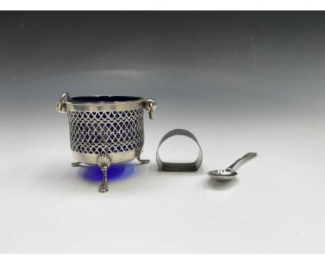 A Victorian silver pierced sugar basket with blue glass liner by H J Cooper &amp; Co Ltd Birmingham 1898, together with a sil