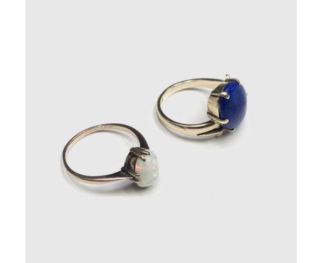 Two 9ct gold rings, one set lapis, the other an opal.