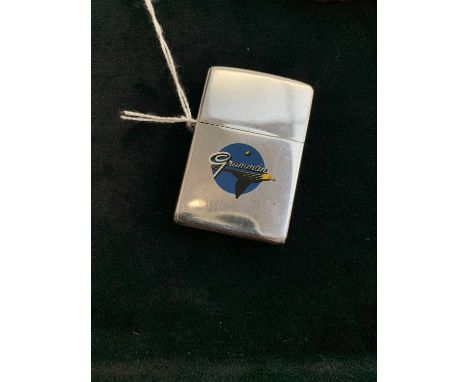 A Zippo Town and Country lighter advertising Grumman AviationCondition report: The wick is used. Please see additional images