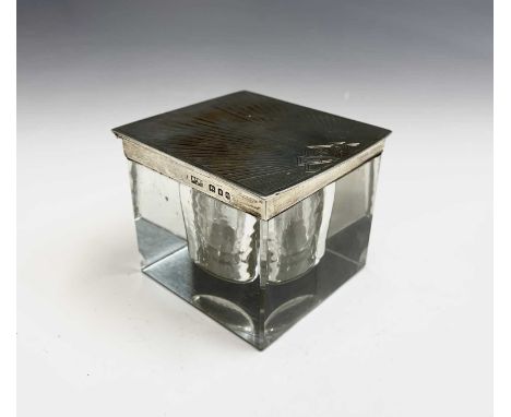 A cut square glass inkwell with heavy art deco engine-turned silver lid by Mappin &amp; Webb Ltd London 1931Condition report: