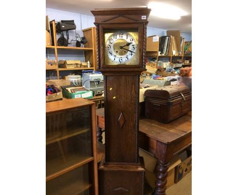 An oak long case clock, with eight day movement