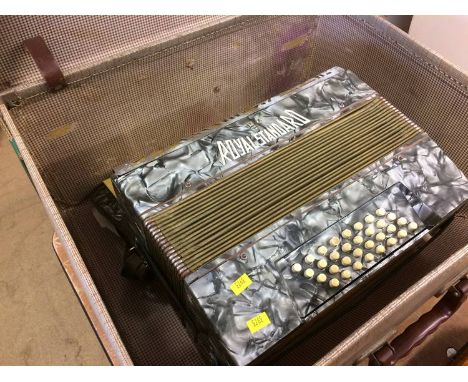 A Royal Standard cased accordion