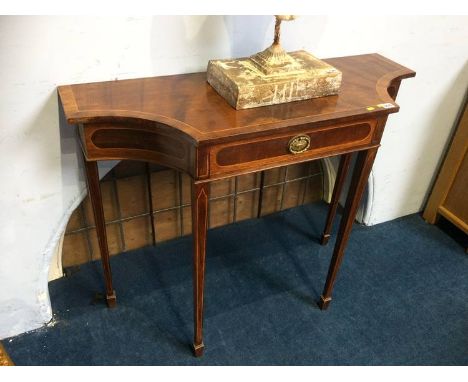 A reproduction mahogany console table