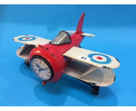Novelty aeroplane clock.
