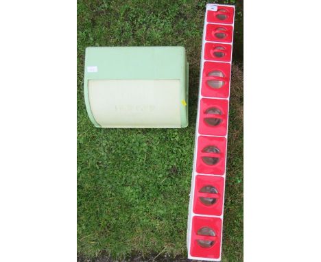 A bread bin and a spice rack