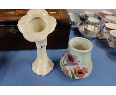 A Belleek vase, formed as a flower, together with a Radford vase, decorated with flowers