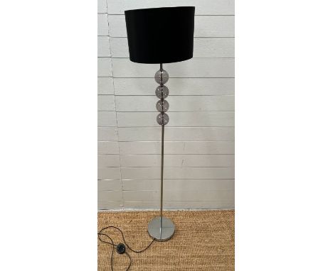 A contemporary floor standing lamp