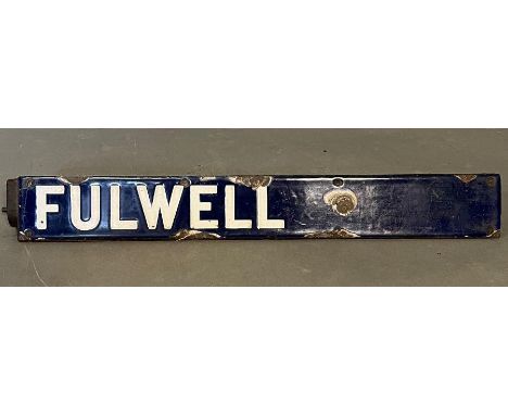 An enamel "Fulwell" sign on wooden base possibly of a bus or tram 