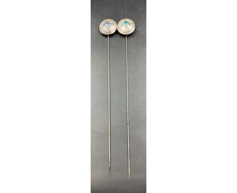 A pair of Charles Horner silver and enamel hat pins, hallmarked for Chester 1911.(27cm long)