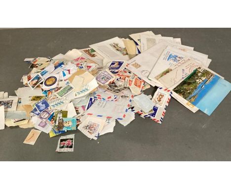 A quantity of UK and world stamps and a small selection of first day covers