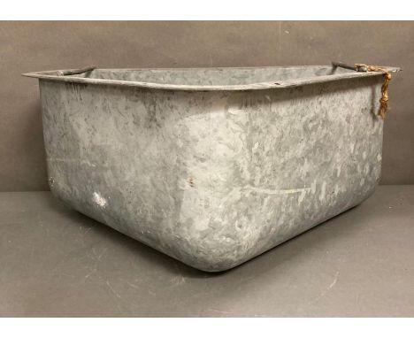 A galvanized steel agricultural food bin could be used as a planter 