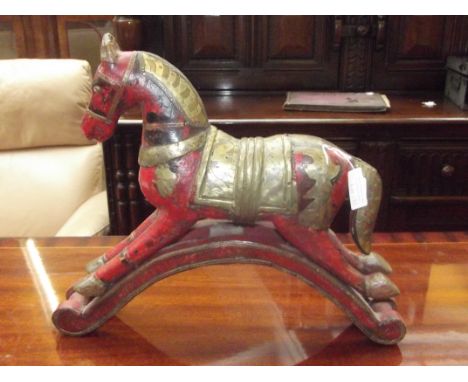 Wood and brass rocking horse figure