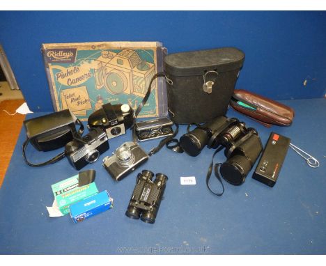A pair of cased binoculars by 'Boots' 10 x 50 mm, a pair of sport glass folding binoculars 25 x 25 mm, a Kodak Brownie, Boots