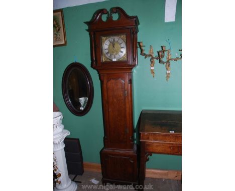 An Oak cased Longcase Clock having unusual two train double weight 30 hour movement with matted brass face with cast brass sp